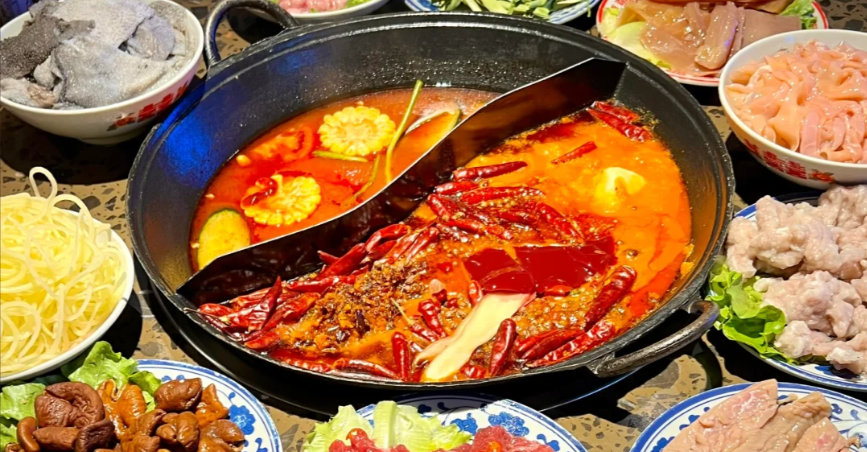 Chinese Hot Pot with various ingredients and broths